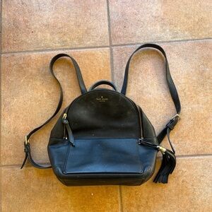 Kate Spade Black Leather Backpack with Gold Accents